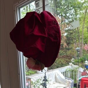 Stylish Red Velvet Hat with Pink Floral Detail